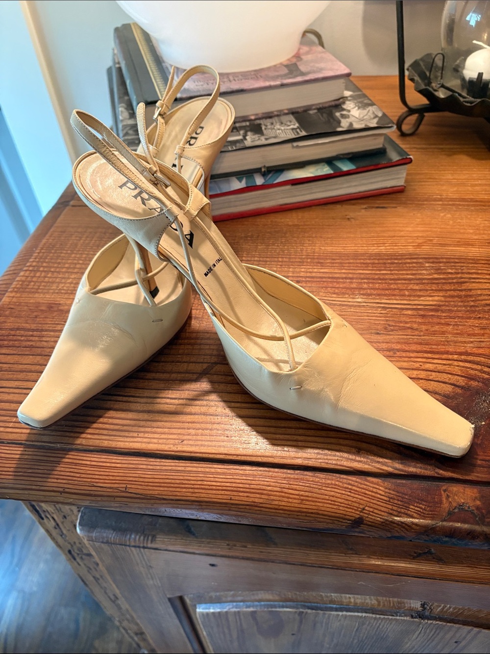 Prada Cream Pointed-Toe Slingback Heels with Ankle Strap